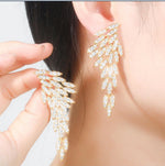 NYSA Feather Earrings